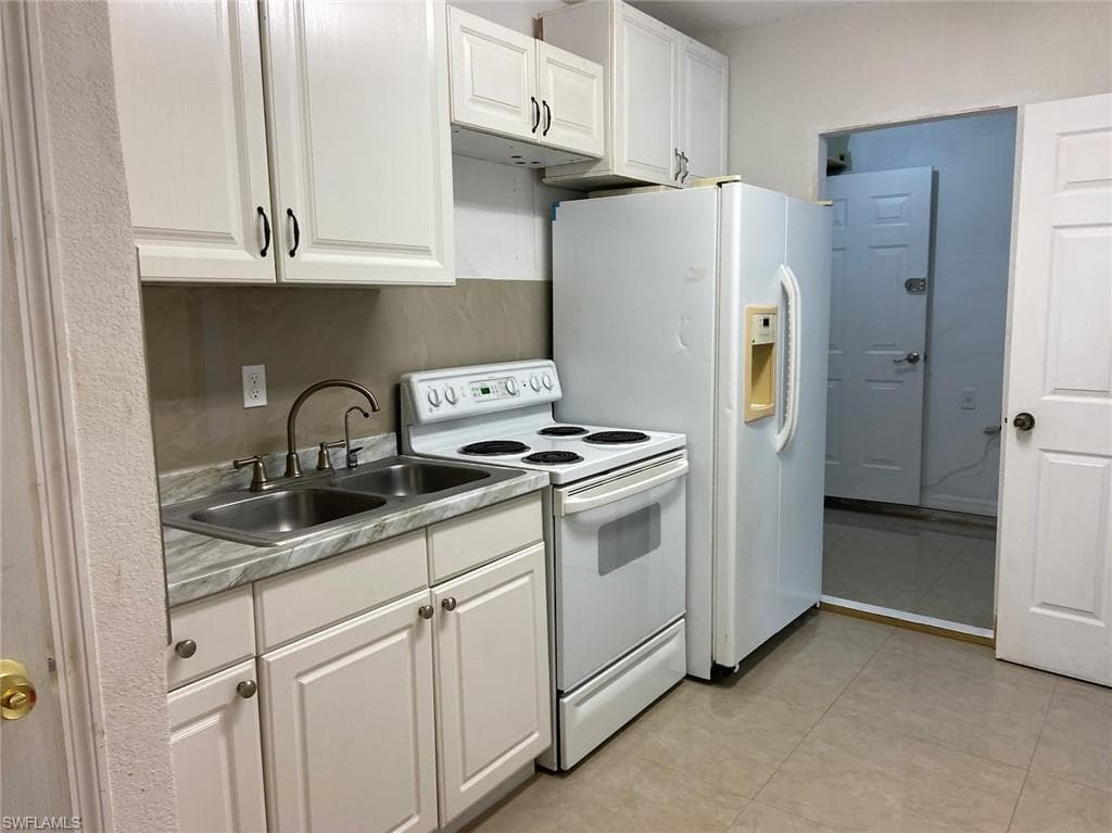 914 Avery St E, Lehigh Acres, FL 33974-23