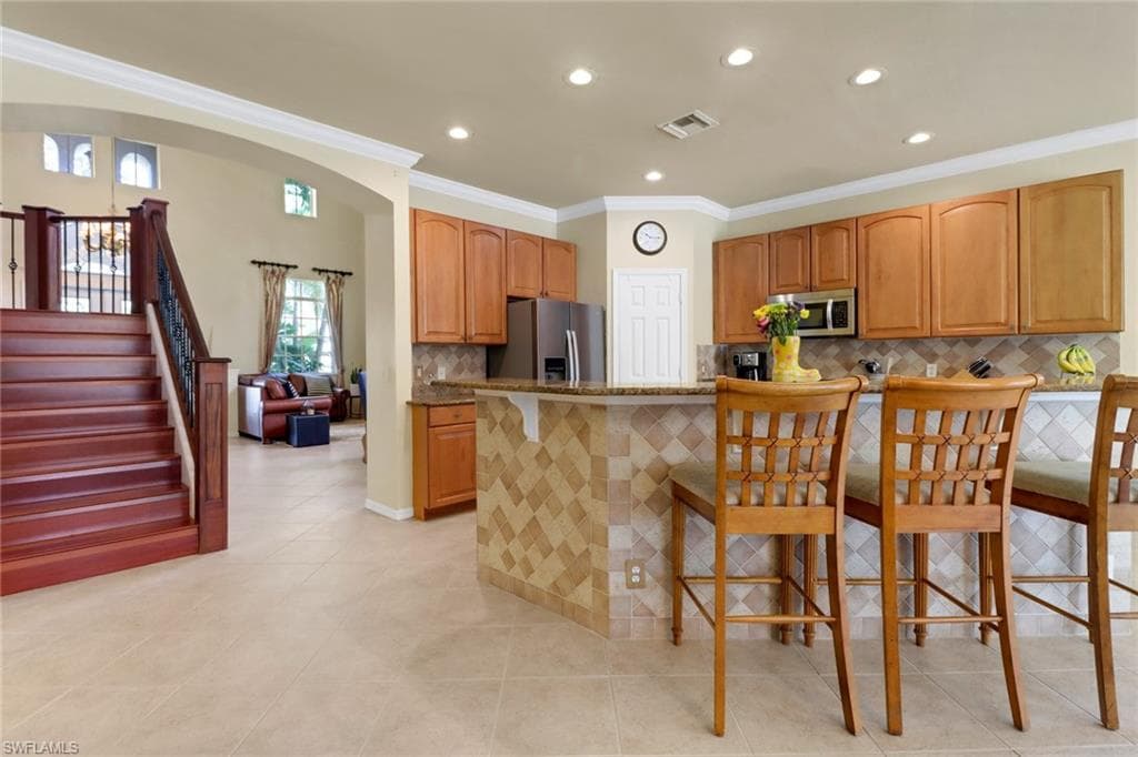5730 Lago Villaggio Way, Naples, FL 34104-11