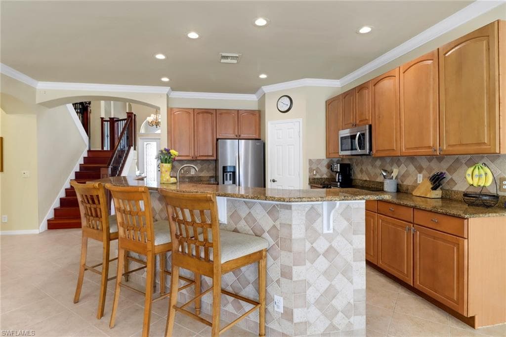 5730 Lago Villaggio Way, Naples, FL 34104-12