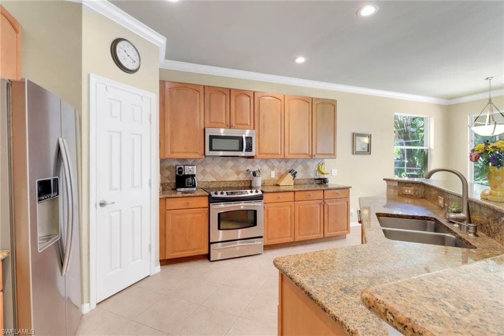 5730 Lago Villaggio Way, Naples, FL 34104-14