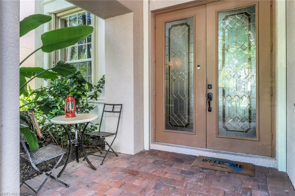5730 Lago Villaggio Way, Naples, FL 34104-4