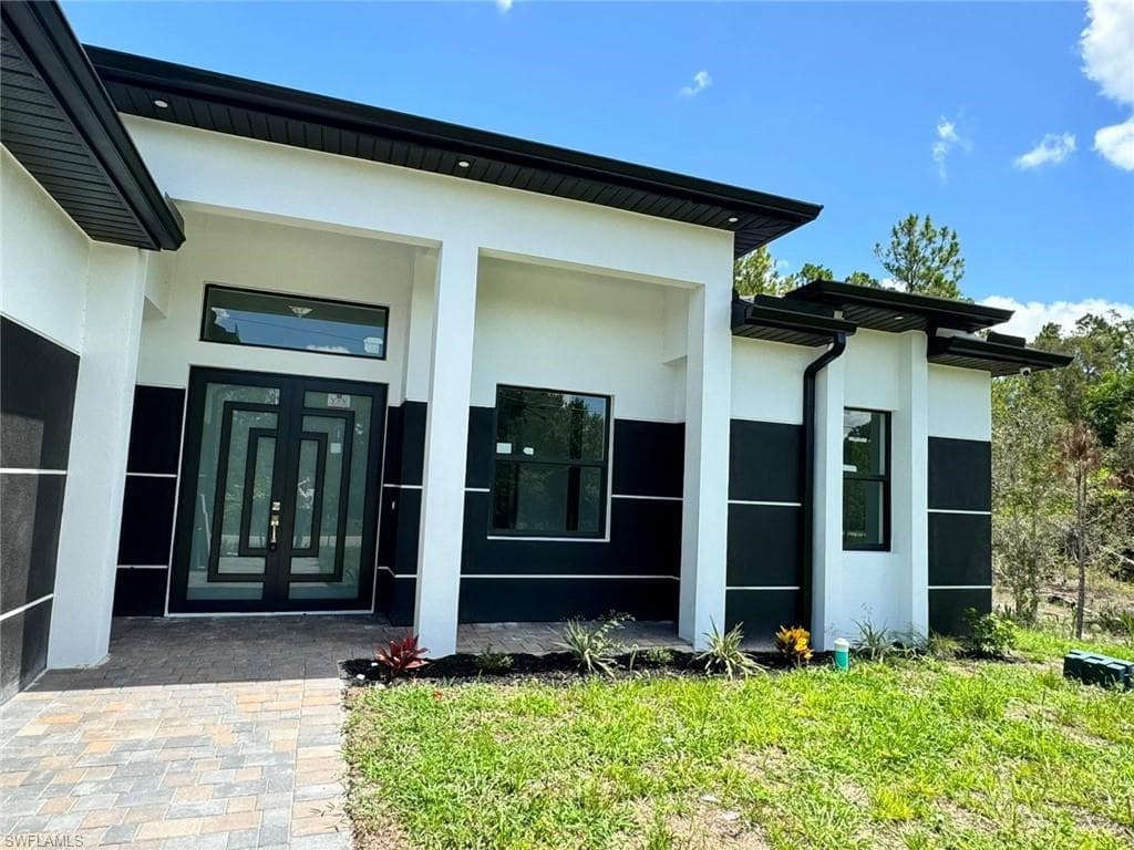1231 Racoon St E, Lehigh Acres, FL 33974-2