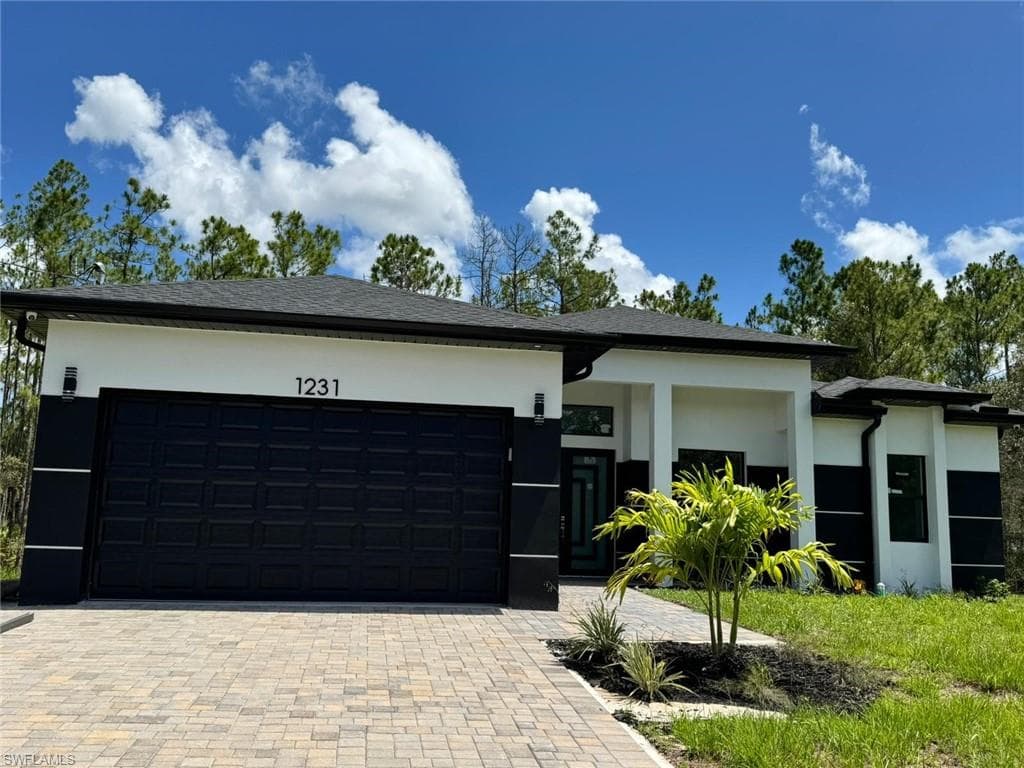 1231 Racoon St E, Lehigh Acres, FL 33974-3