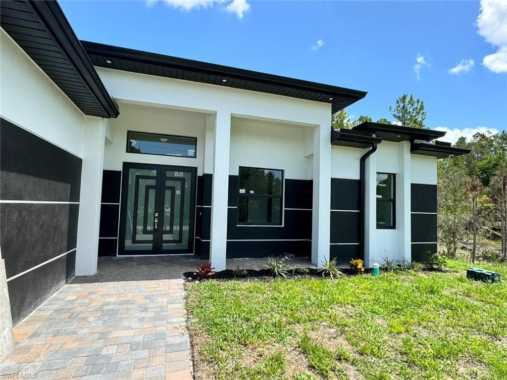 1231 Racoon St E, Lehigh Acres, FL 33974-4