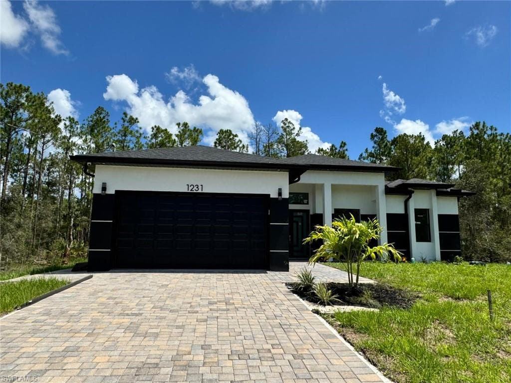 1231 Racoon St E, Lehigh Acres, FL 33974-7