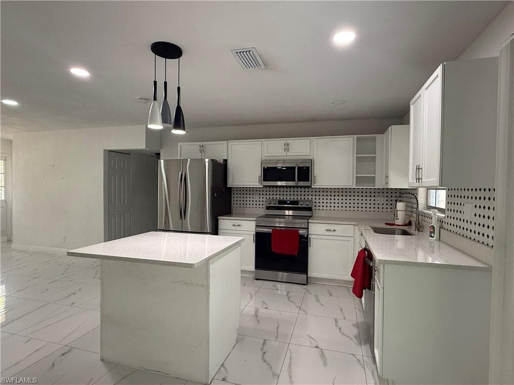 340 Grovewood Ave S, Lehigh Acres, FL 33936-4
