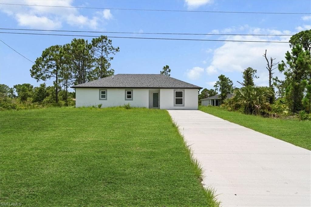 460 Columbus Blvd S, Lehigh Acres, FL 33974-1