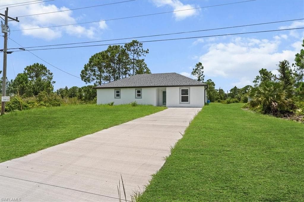 460 Columbus Blvd S, Lehigh Acres, FL 33974-3