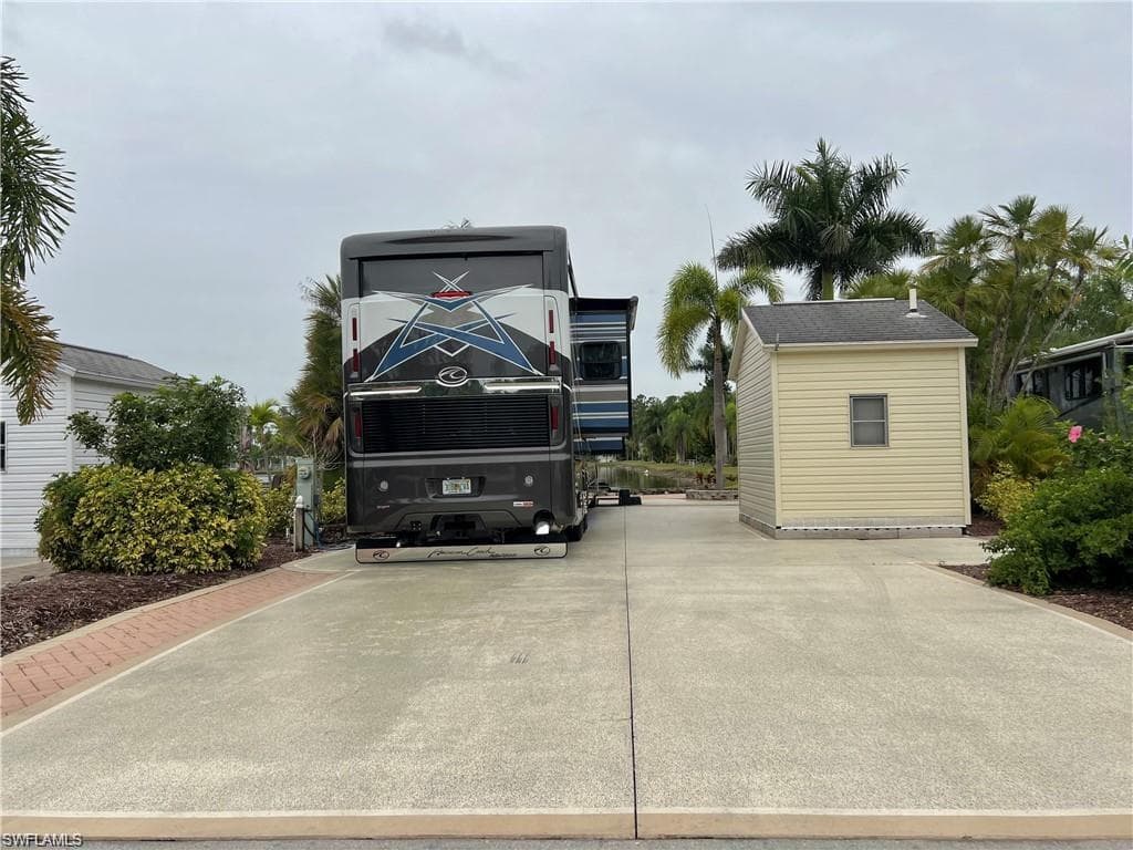 3174 Crystal Lake Dr, Naples, FL 34120-3