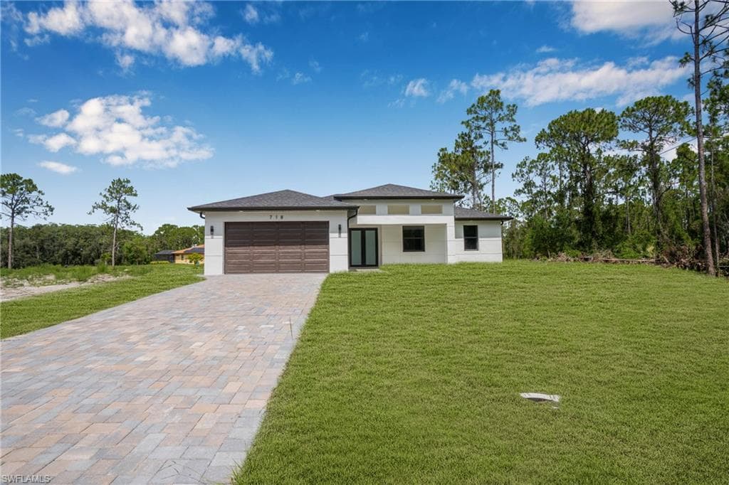 718 Bennington Dr, Lehigh Acres, FL 33974-2