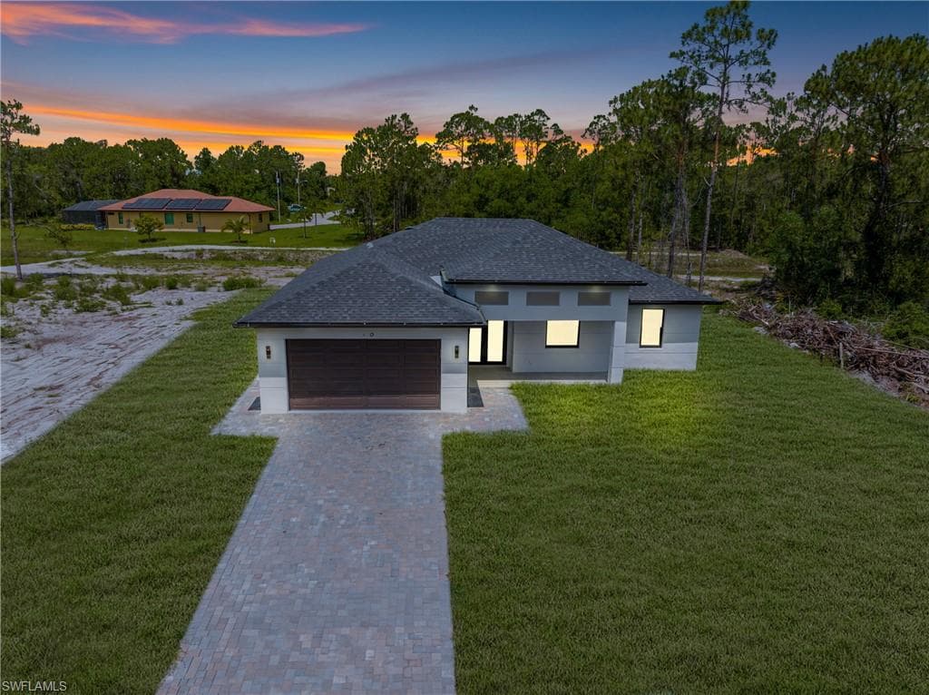718 Bennington Dr, Lehigh Acres, FL 33974-3