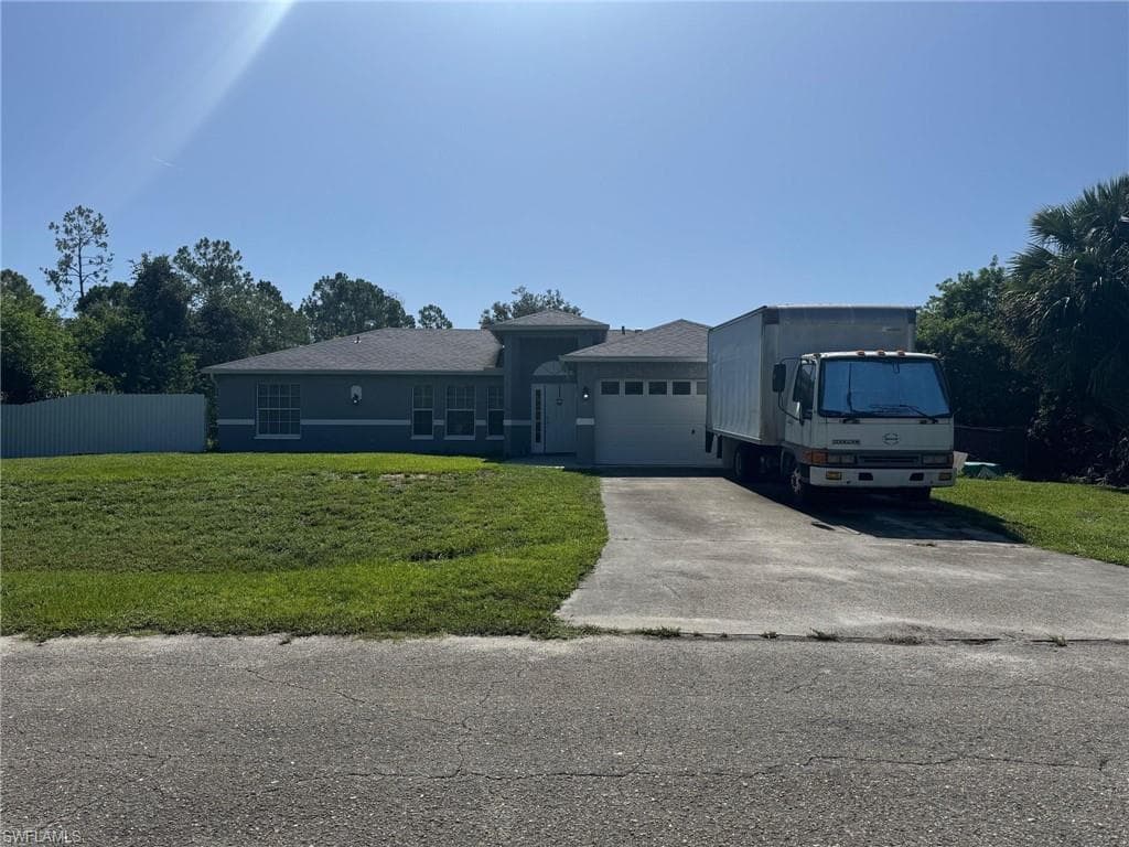 602 Eighth Ave, Lehigh Acres, FL 33972-1