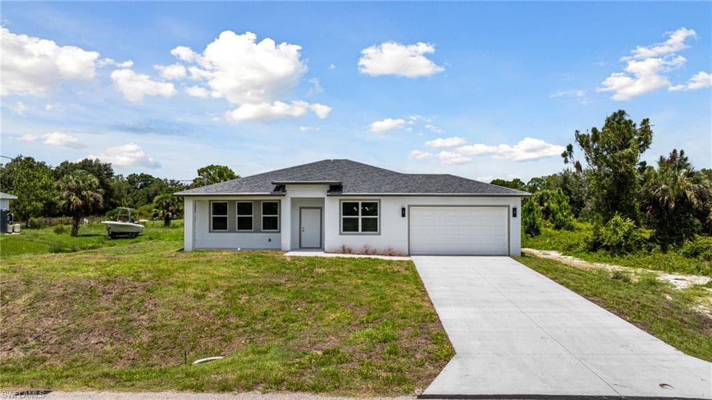 1909 Moore Ave, Lehigh Acres, FL 33972-1