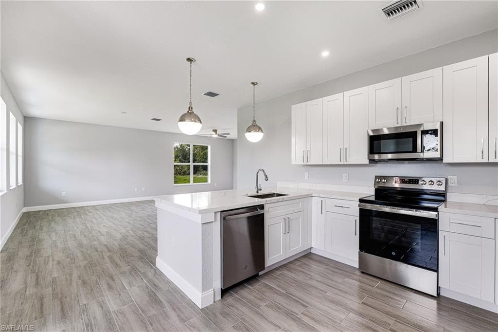 1909 Moore Ave, Lehigh Acres, FL 33972-3