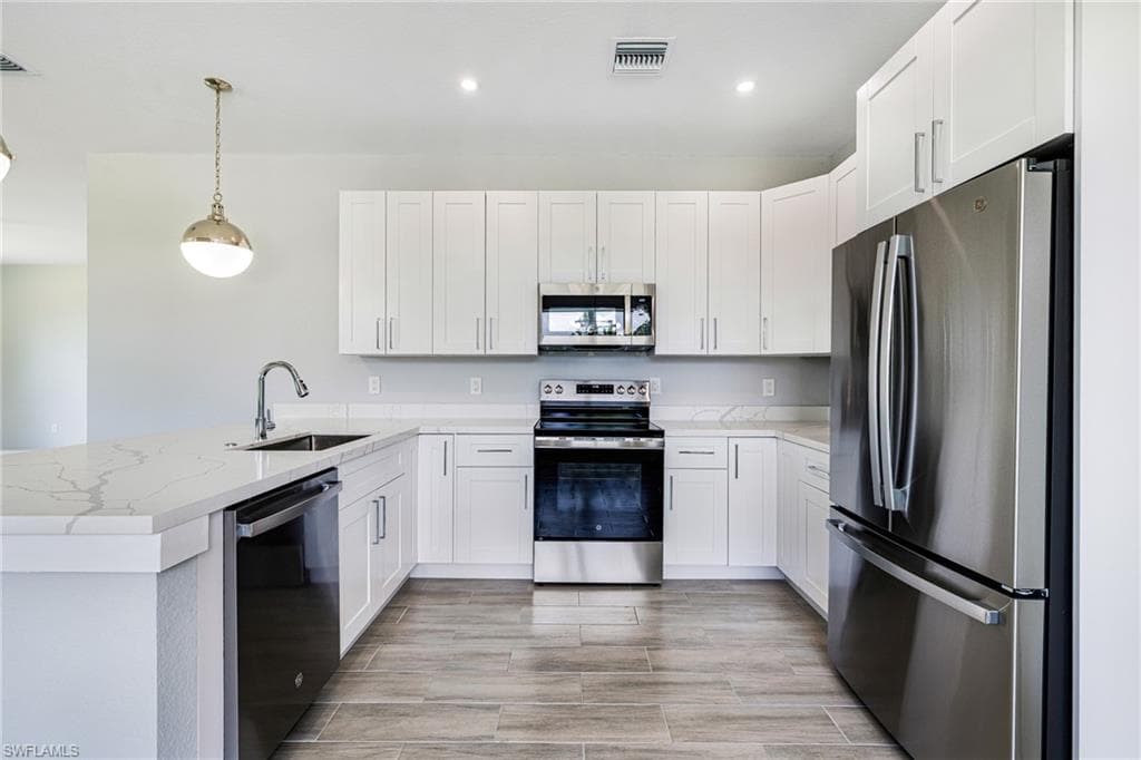 1909 Moore Ave, Lehigh Acres, FL 33972-5