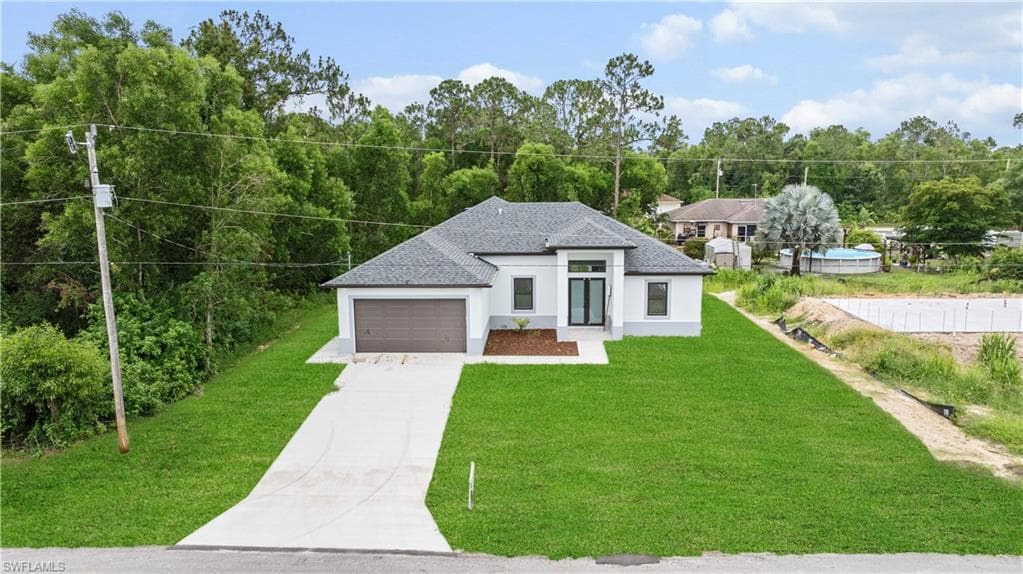 353 Nathan Ave, Lehigh Acres, FL 33974-1