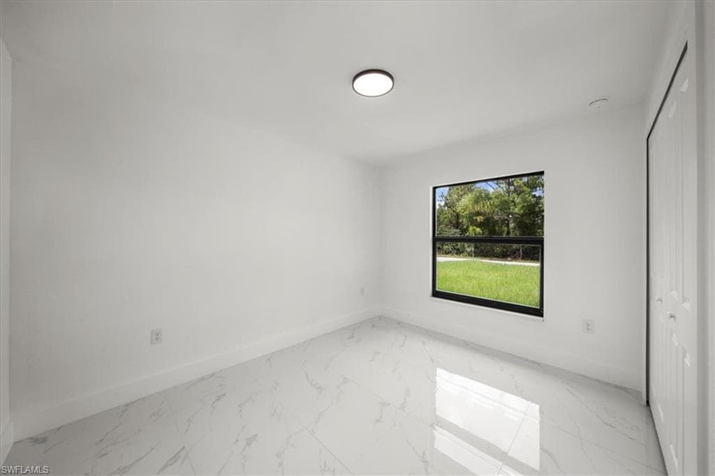 668/670 Chemstrand St E, Lehigh Acres, FL 33974-13