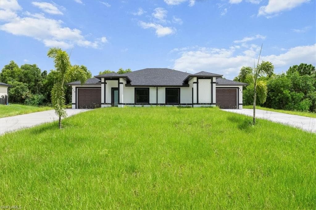668/670 Chemstrand St E, Lehigh Acres, FL 33974-2