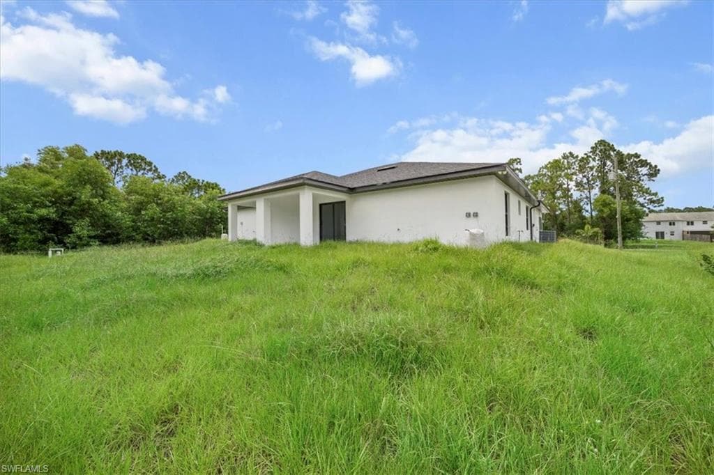 668/670 Chemstrand St E, Lehigh Acres, FL 33974-33