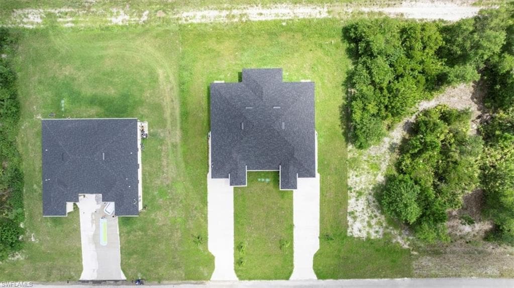 668/670 Chemstrand St E, Lehigh Acres, FL 33974-4
