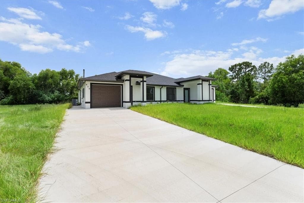 668/670 Chemstrand St E, Lehigh Acres, FL 33974-5