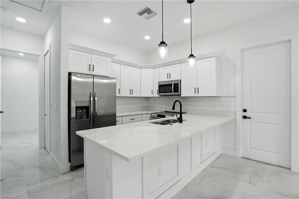 4881/4883 Leonard Blvd S, Lehigh Acres, FL 33973-9