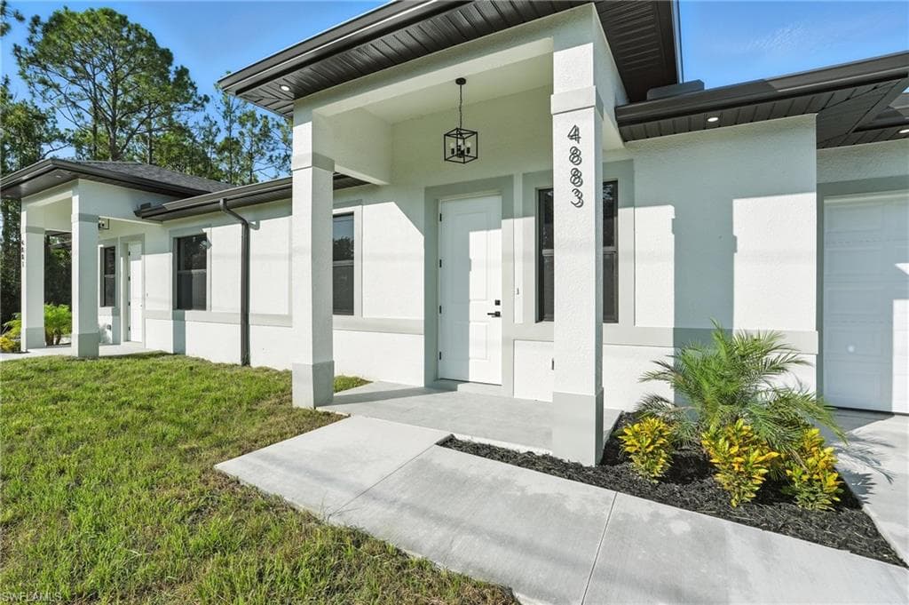 4881/4883 Leonard Blvd S, Lehigh Acres, FL 33973-1