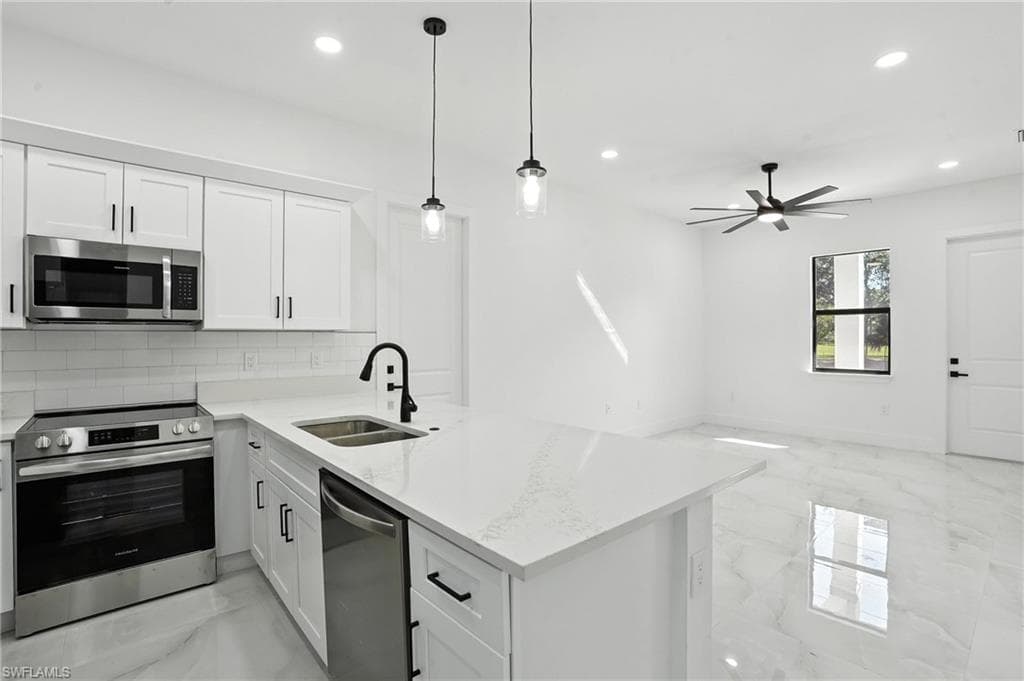 4881/4883 Leonard Blvd S, Lehigh Acres, FL 33973-7