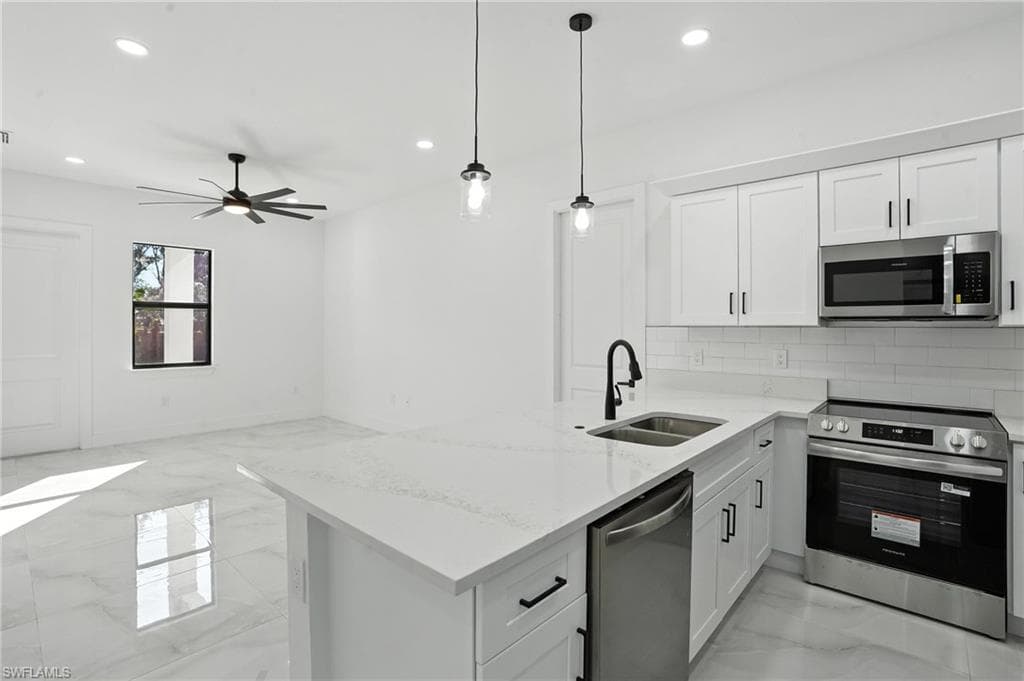 4881/4883 Leonard Blvd S, Lehigh Acres, FL 33973-8