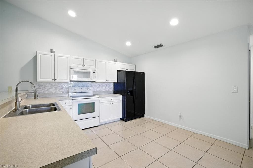 472/474 Petite Ave, Lehigh Acres, FL 33974-5