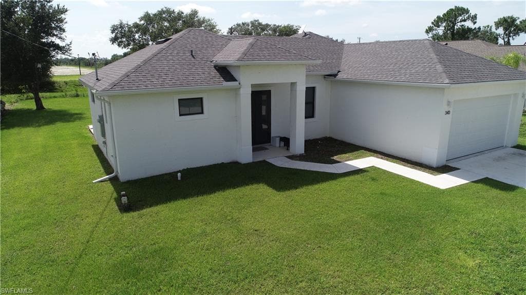 343 Rawlings Ave, Lehigh Acres, FL 33974-2