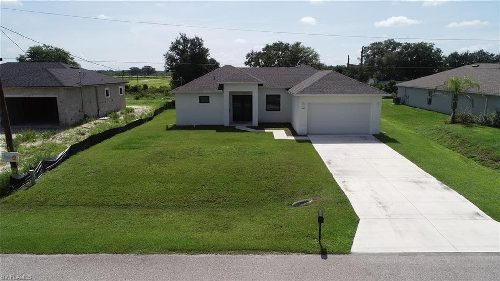 343 Rawlings Ave, Lehigh Acres, FL 33974-3