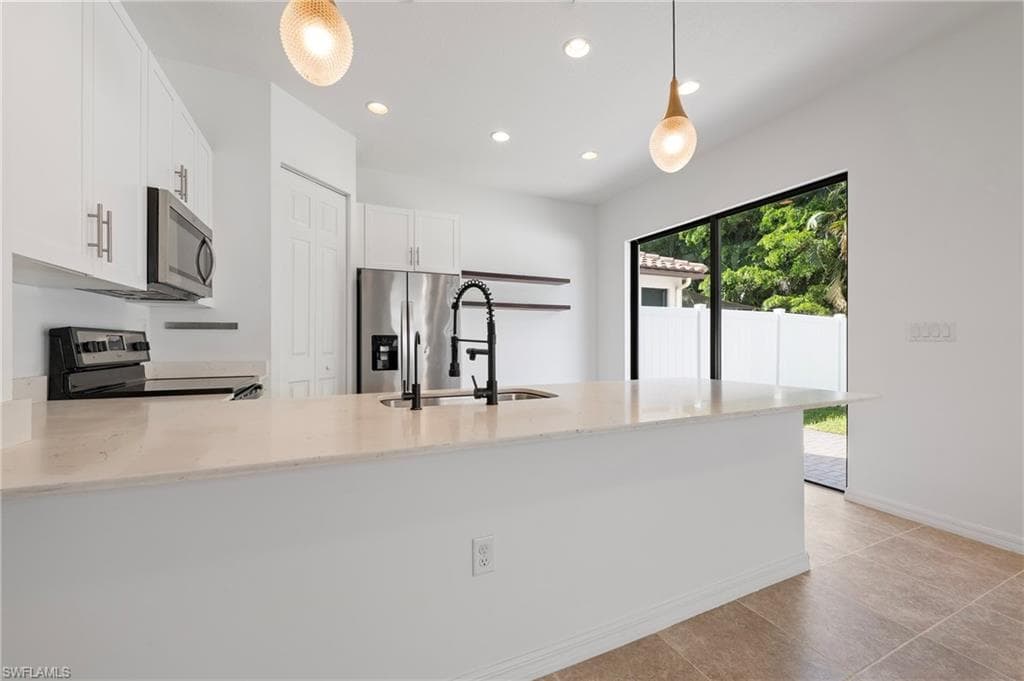 8797 Madrid Cir, Naples, FL 34104-10