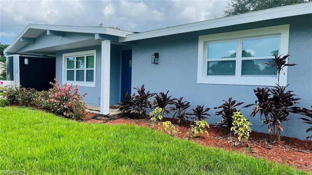 4 Palm Blvd, Lehigh Acres, FL 33936-3