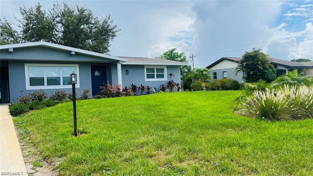 4 Palm Blvd, Lehigh Acres, FL 33936-4