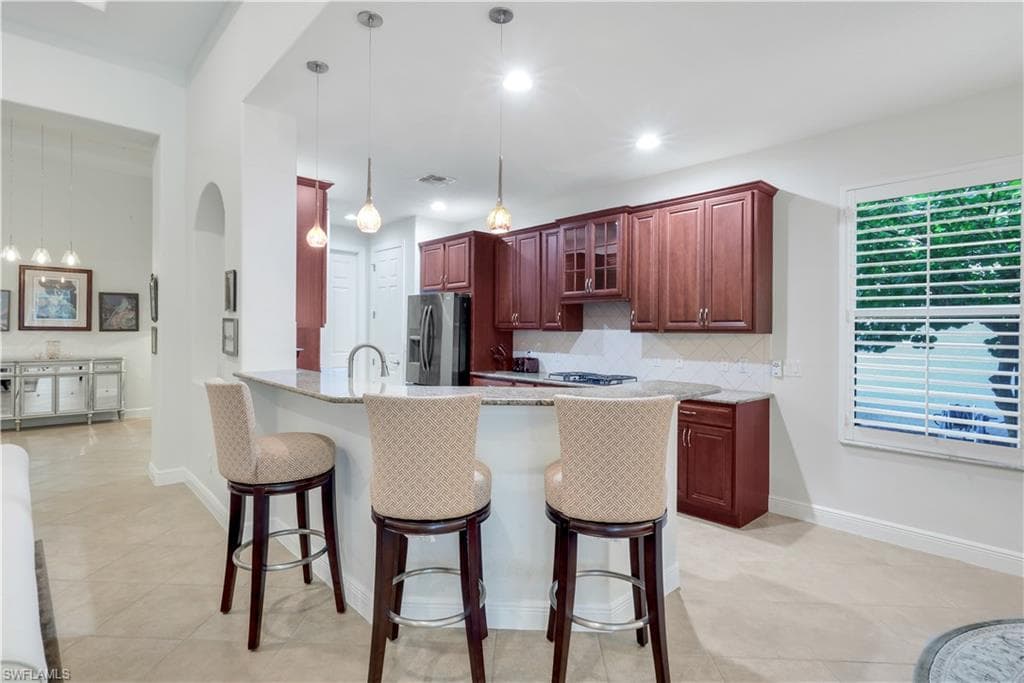 12719 Aviano Dr, Naples, FL 34105-9