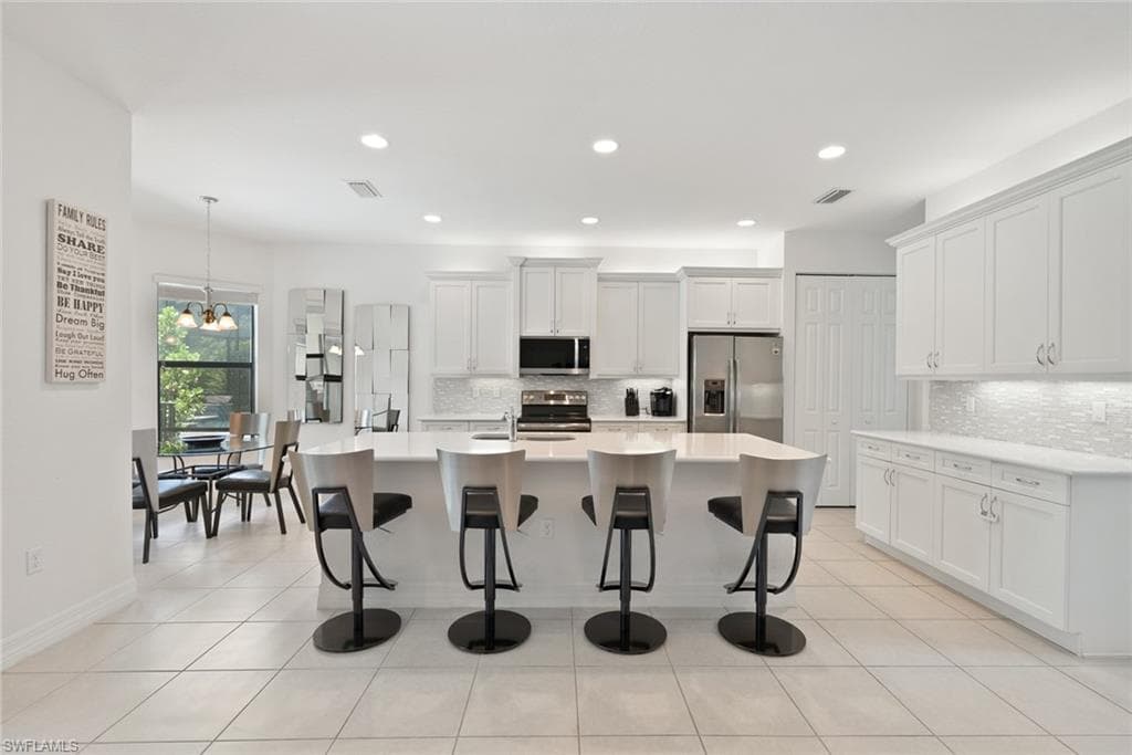 13750 Callisto Ave, Naples, FL 34109-8