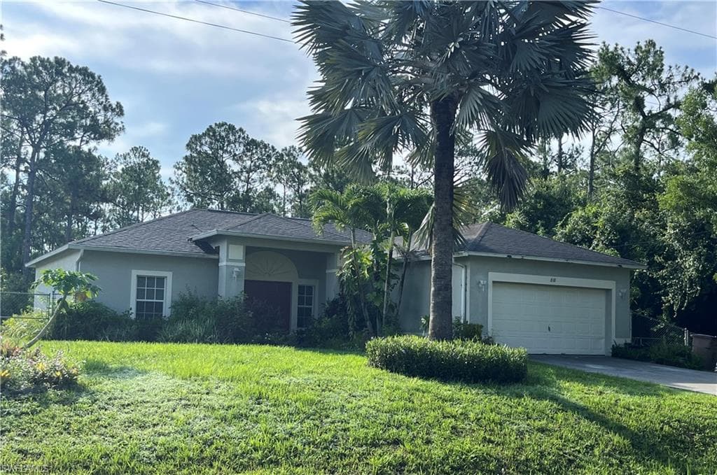 818 Desoto Ave, Lehigh Acres, FL 33972-1
