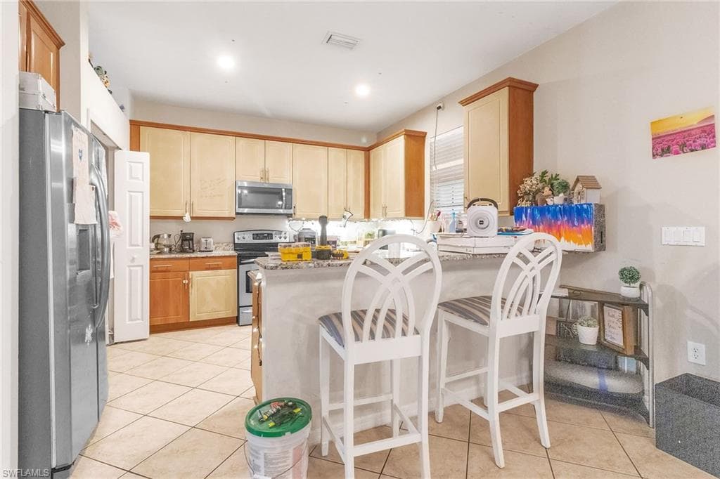 7666 Bristol Cir, Naples, FL 34120-16