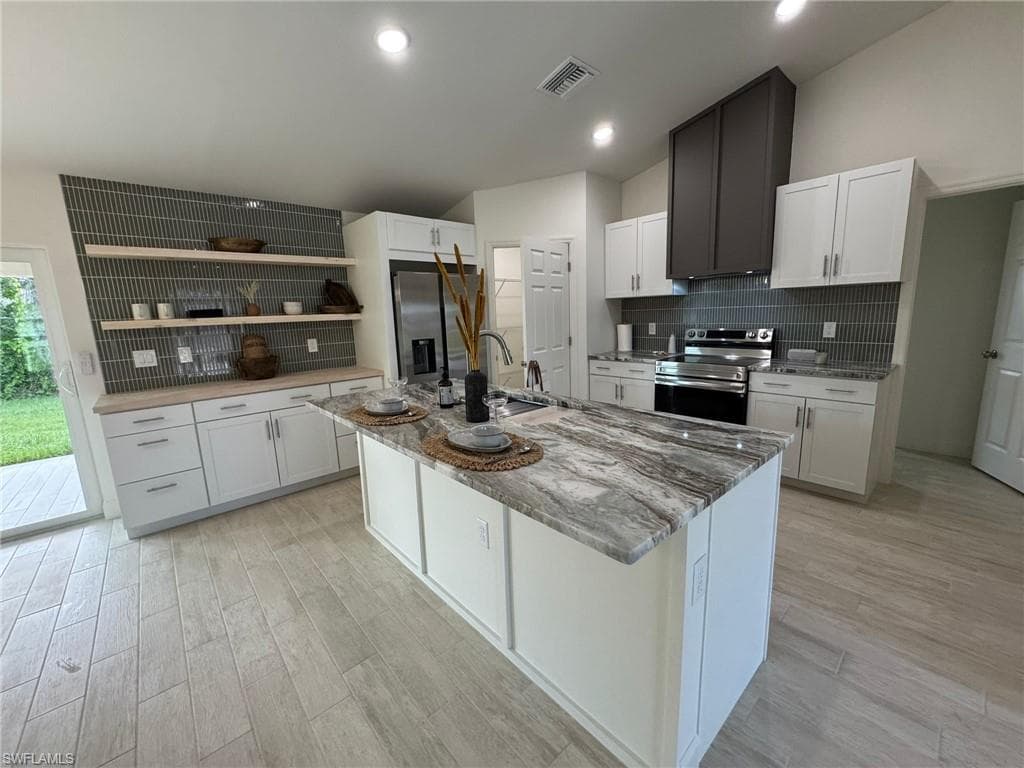 1027 Alfreda Ave, Lehigh Acres, FL 33971-1