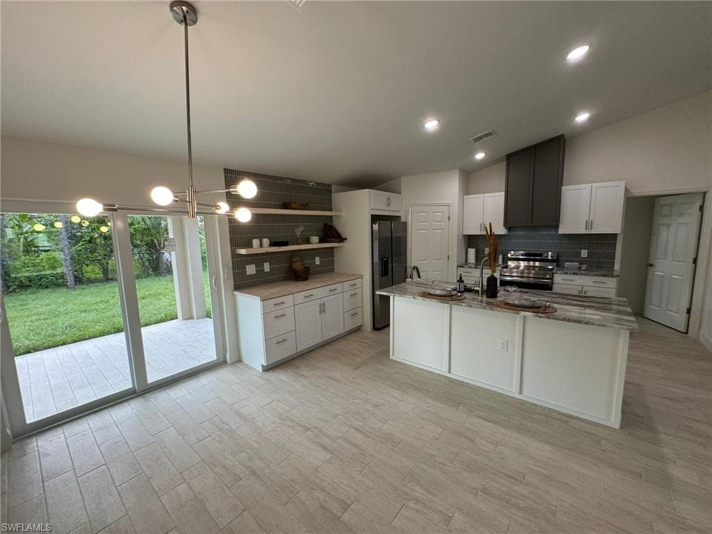 1027 Alfreda Ave, Lehigh Acres, FL 33971-3