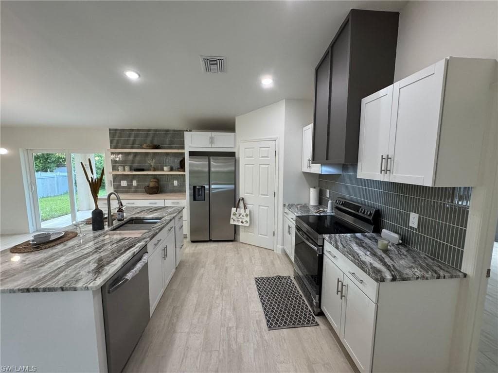1027 Alfreda Ave, Lehigh Acres, FL 33971-6