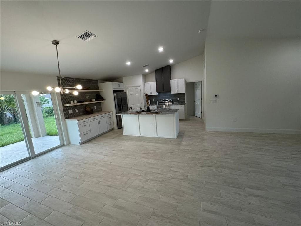 1027 Alfreda Ave, Lehigh Acres, FL 33971-7