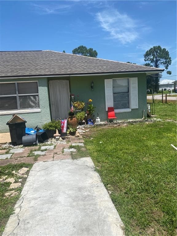 2400/2402 Lantana Ave S, Lehigh Acres, FL 33973-4