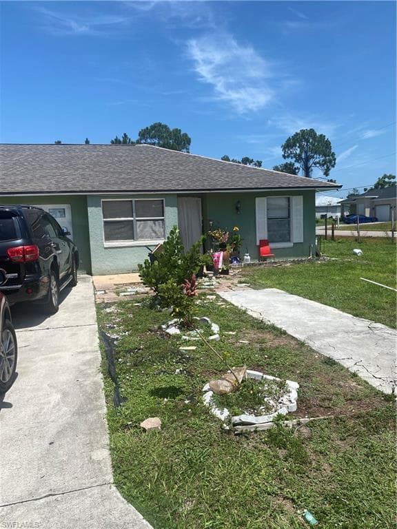 2400/2402 Lantana Ave S, Lehigh Acres, FL 33973-5