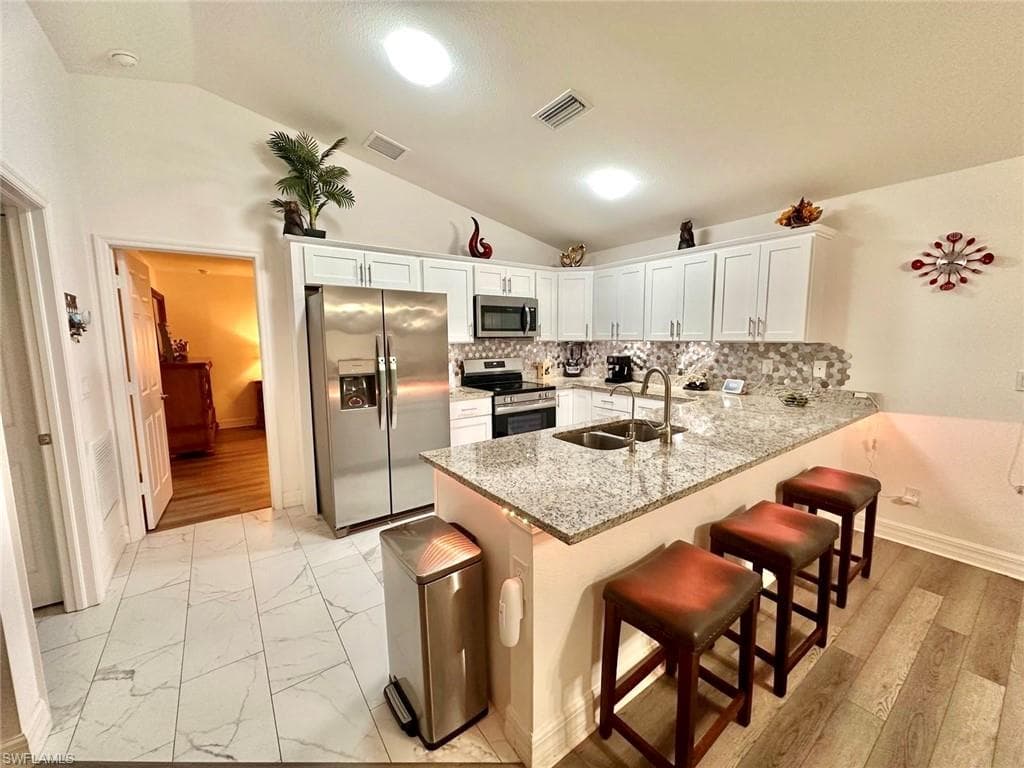 408 7th Ter, Cape Coral, FL 33909-11