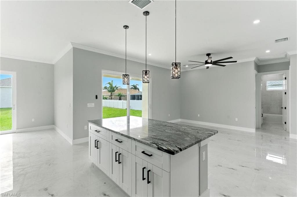 303 26th Ave, Cape Coral, FL 33993-4