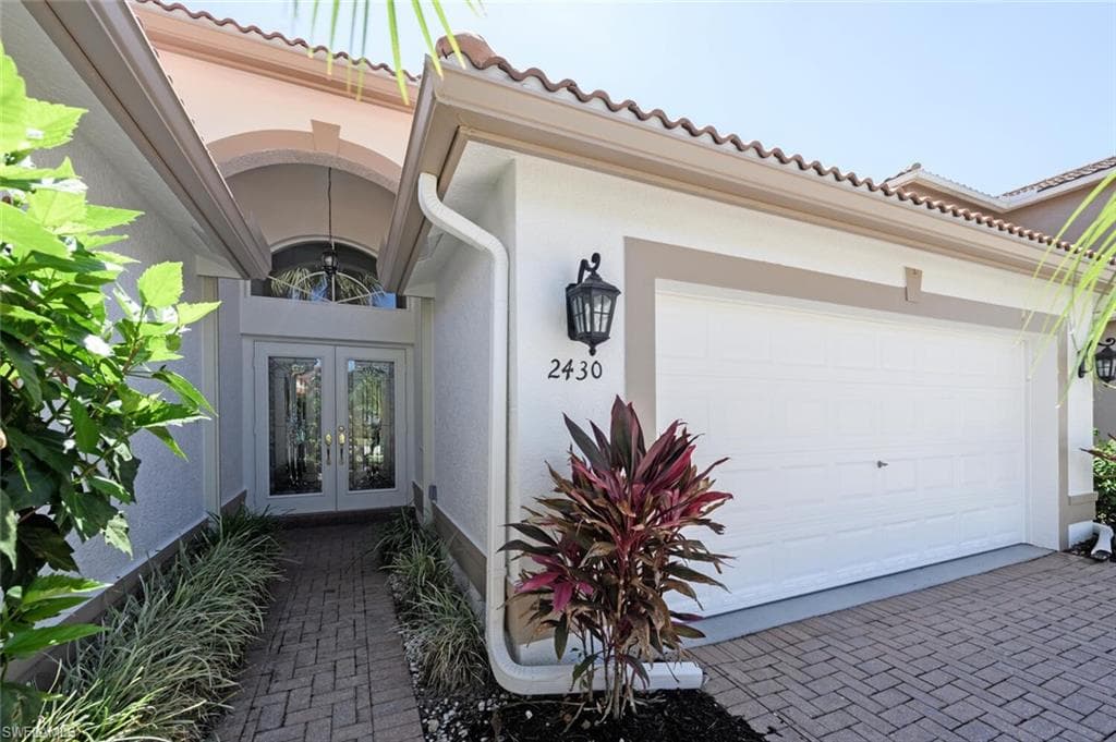 2430 Butterfly Palm Dr, Naples, FL 34119-3