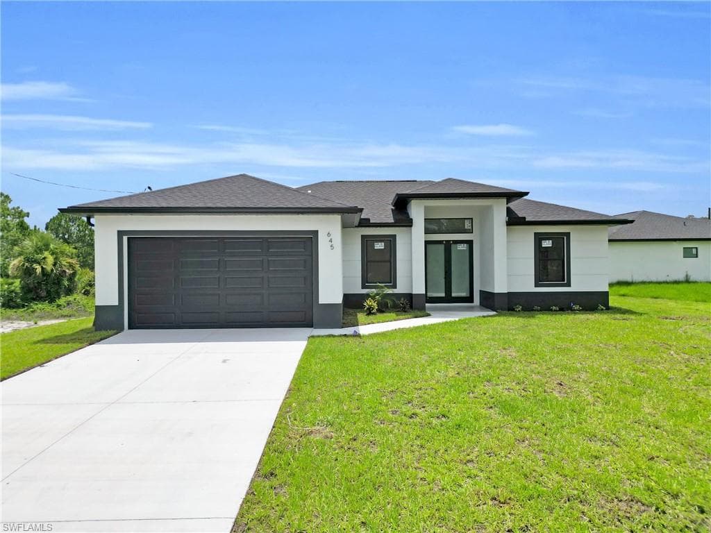 825 Frederick Reid St E, Lehigh Acres, FL 33971-1