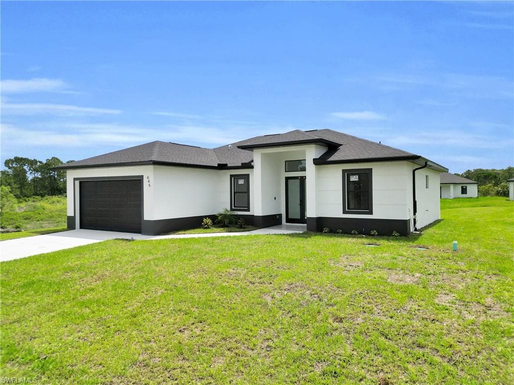 825 Frederick Reid St E, Lehigh Acres, FL 33971-3